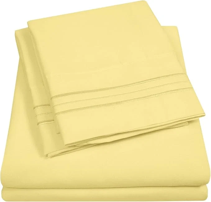 Relaxed King Size Sheet Set with Built-in Sheet Straps - Deep Pocket Fitted Sheet Flat Sheet amp Pillowcases - Soft Wrinkle- Secure Fit - Pale Yellow Crafted
