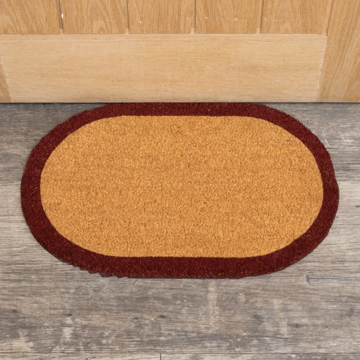 Fine Crafted Natural Oval Coir Door Mat with a Wine Red Border Soft